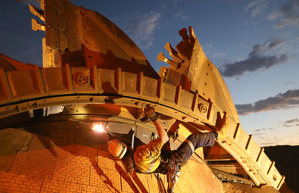 Rope access welder maintenance abseiler wearing fall safety body ABB Gearless Mill Drives