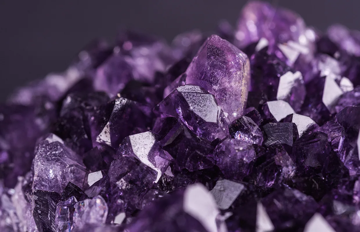 Amethysts geode on black background